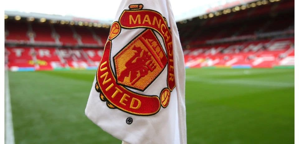 Bandera de esquina con el logo de Manchester United