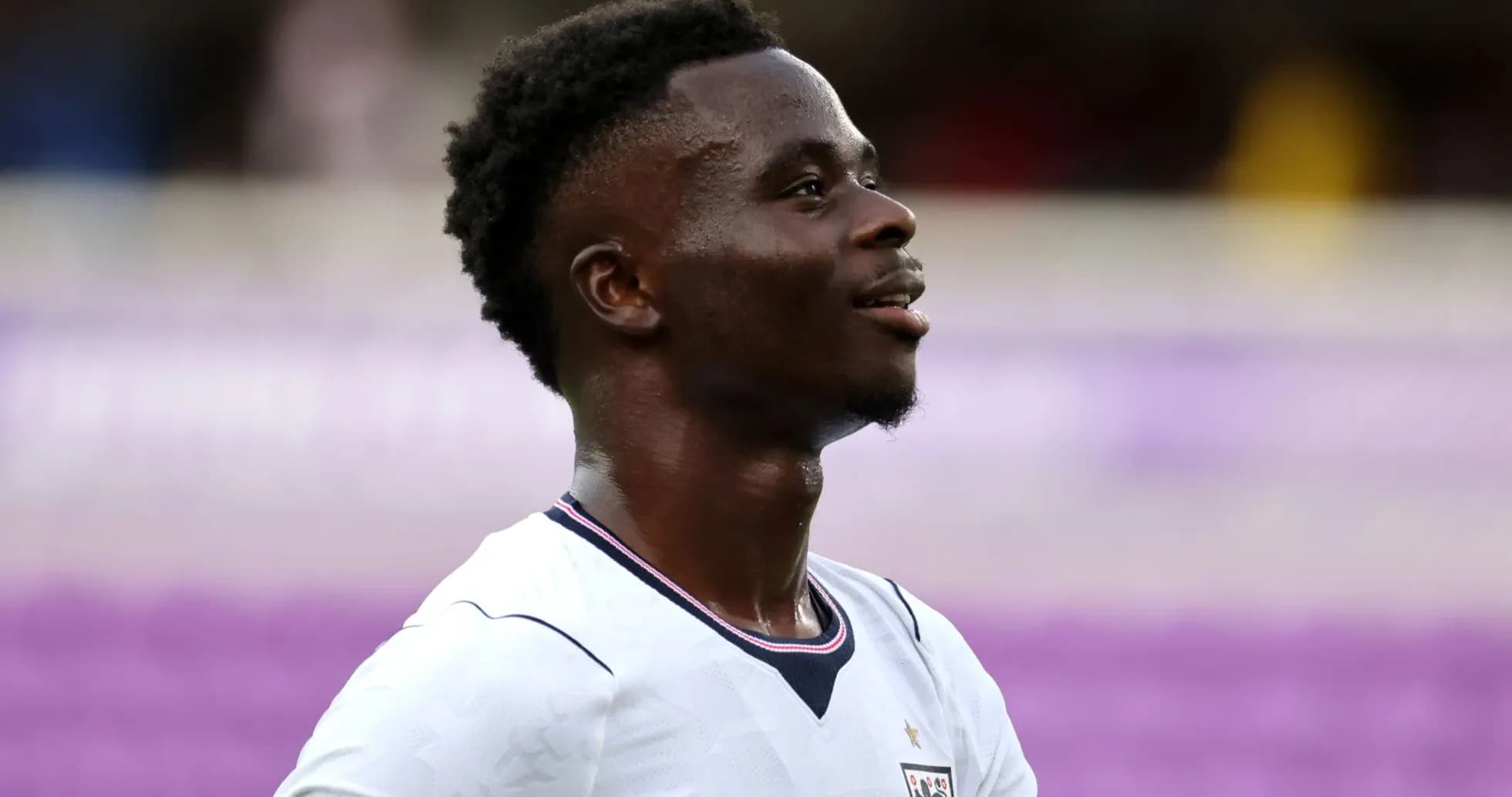 Jugador de Inglaterra sonriendo durante el partido
