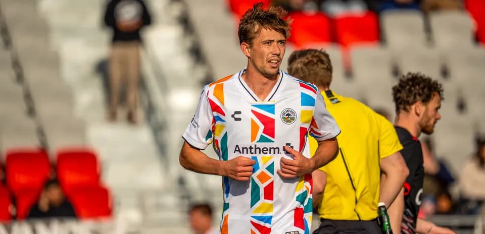 Jugador de Oakland Roots en partido de fútbol