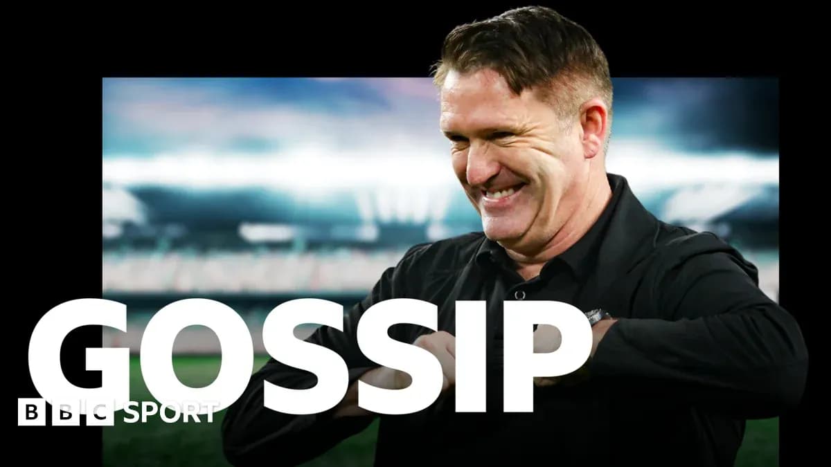 Entrenador sonriendo durante una entrevista deportiva