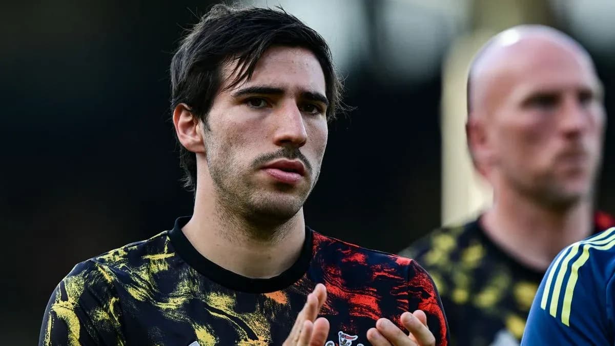 Jugador aplaudiendo durante calentamiento en el campo
