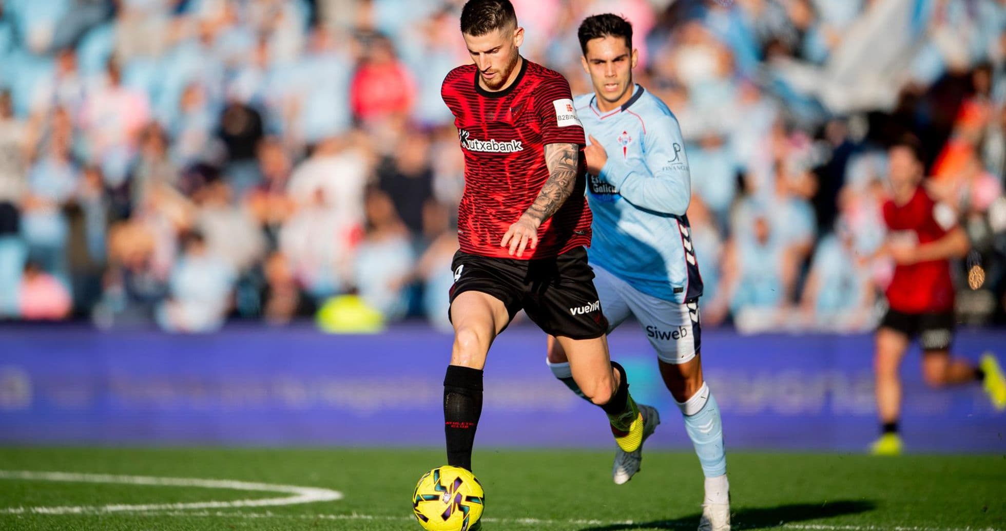 Jugador de Athletic Club en acción contra Celta Vigo Jugador de Athletic Club en acción contra Celta Vigo